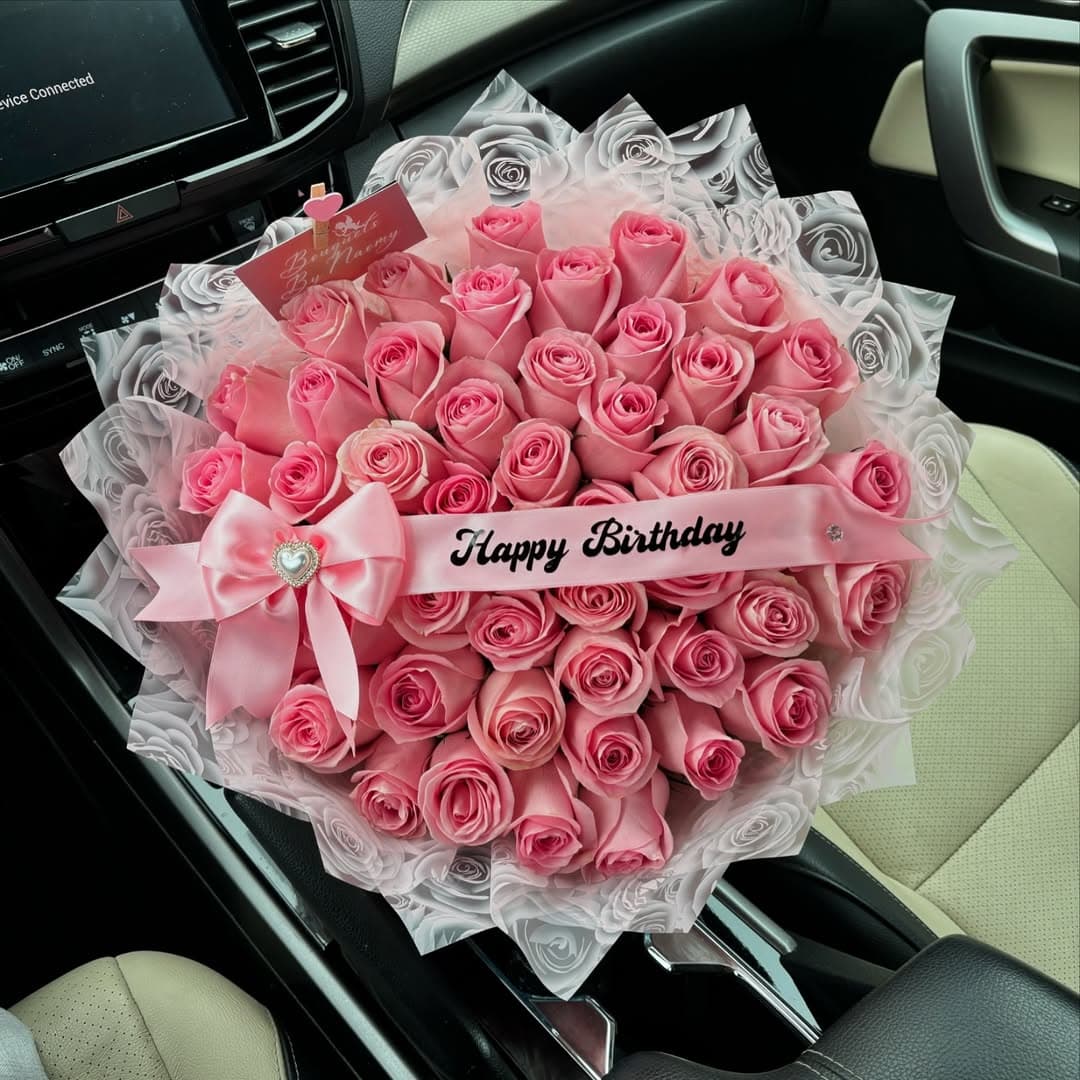 Handcrafted floral arrangement by Bouquets by Naomy