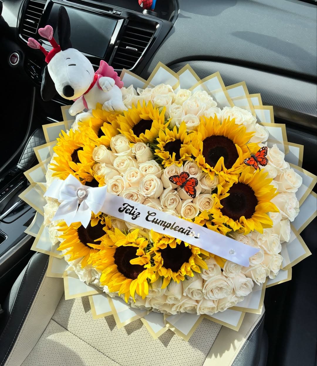 Signature arrangement by Bouquets by Naomy